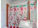 Bathroom with a sink, toilet, and shower curtain at 1363 & 1367 S Belmont Ave, Indianapolis, IN 46221