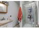 Small bathroom with shower and vanity at 1363 & 1367 S Belmont Ave, Indianapolis, IN 46221