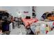 A cluttered bedroom with a bed, dresser and various items at 1363 & 1367 S Belmont Ave, Indianapolis, IN 46221