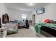 Primary bedroom with a bed, crib, and other bedroom furniture at 1363 & 1367 S Belmont Ave, Indianapolis, IN 46221