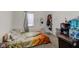 Bedroom with a double bed, window, and closet at 1363 & 1367 S Belmont Ave, Indianapolis, IN 46221