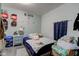 Bedroom with a double bed and chair at 1363 & 1367 S Belmont Ave, Indianapolis, IN 46221