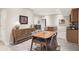 Basement dining area with wood table and chairs, adjacent to kitchen at 15110 Champion Cir, Carmel, IN 46033