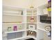 Well-organized pantry with ample shelving for storage at 15110 Champion Cir, Carmel, IN 46033