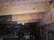 Unfinished basement with exposed support beams and pipes at 1601 Spann Ave, Indianapolis, IN 46203