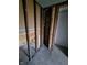 Under construction bathroom with exposed framing and brick at 1601 Spann Ave, Indianapolis, IN 46203