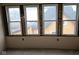 Four-window view with exposed framing and insulation at 1601 Spann Ave, Indianapolis, IN 46203
