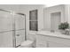 Bathroom with glass shower, white vanity with quartz countertop, and tiled walls at 19452 Lewis Cir, Westfield, IN 46074