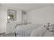 Bright bedroom featuring a white dresser with decorative mirror and a cozy bed with a stuffed animal at 19452 Lewis Cir, Westfield, IN 46074