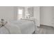 Bedroom features neutral decor, comfortable bed, dresser and lots of light at 19452 Lewis Cir, Westfield, IN 46074