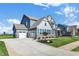 Stunning two-story home with a side-entry garage and manicured landscaping at 19452 Lewis Cir, Westfield, IN 46074