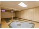 Unfinished basement with neutral walls and unique flooring at 30 Village Ct, Zionsville, IN 46077