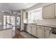 Spacious kitchen boasts stainless steel appliances and granite countertops at 30 Village Ct, Zionsville, IN 46077
