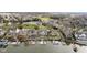Aerial view of lakefront homes with private docks at 3150 Beach Blvd, Cicero, IN 46034