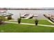 Lakefront backyard with private dock and lush landscaping at 3150 Beach Blvd, Cicero, IN 46034