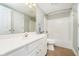 Clean bathroom with white vanity, tub, and tile floor at 3150 Beach Blvd, Cicero, IN 46034