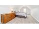 Spacious bedroom with carpeted floor, dresser, and large bed at 3150 Beach Blvd, Cicero, IN 46034