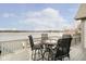 Enjoy water views from this lakeside deck with seating for four at 3150 Beach Blvd, Cicero, IN 46034