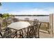 Outdoor dining furniture set on deck overlooking the lake at 3150 Beach Blvd, Cicero, IN 46034