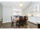 Bright dining area with table and chairs, adjacent to kitchen at 3150 Beach Blvd, Cicero, IN 46034