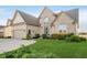 Beautiful brick home boasting a lush lawn and tidy landscaping at 3150 Beach Blvd, Cicero, IN 46034