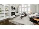 Spacious living room with a fireplace and built in shelving at 3150 Beach Blvd, Cicero, IN 46034
