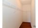 Walk-in closet showcasing a wire shelving system and hardwood floors at 316 Society Dr, Indianapolis, IN 46229