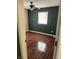 Charming bedroom with dark walls and hardwood floors at 3355 Wallace Ave, Indianapolis, IN 46218