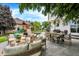Landscaped backyard with patio furniture, a dining area and playground at 3828 Highland Park Dr, Greenwood, IN 46143