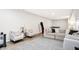 Spacious finished basement with comfortable seating and a ping pong table at 3828 Highland Park Dr, Greenwood, IN 46143
