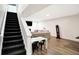 Finished basement with a seating area and exercise equipment at 3828 Highland Park Dr, Greenwood, IN 46143