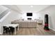 Finished basement with sectional sofa, fireplace, and a play area at 3828 Highland Park Dr, Greenwood, IN 46143