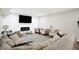 Finished basement featuring a sectional sofa, fireplace, and plenty of space at 3828 Highland Park Dr, Greenwood, IN 46143