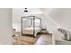 Charming bedroom with a canopy bed and plenty of natural light at 3828 Highland Park Dr, Greenwood, IN 46143