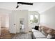 Bedroom with sofa and large mirror at 3828 Highland Park Dr, Greenwood, IN 46143