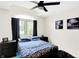 Bedroom with a double bed and large window at 3828 Highland Park Dr, Greenwood, IN 46143