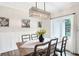 Modern farmhouse dining room with chandelier and wainscoting at 3828 Highland Park Dr, Greenwood, IN 46143