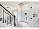 Elegant entryway with a grand staircase and stained-glass door at 3828 Highland Park Dr, Greenwood, IN 46143