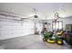 Spacious garage with overhead storage, and room for multiple vehicles at 3828 Highland Park Dr, Greenwood, IN 46143