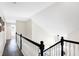 Long hallway with white walls and hardwood floors at 3828 Highland Park Dr, Greenwood, IN 46143