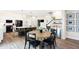 Open concept kitchen features an island with seating and modern appliances at 3828 Highland Park Dr, Greenwood, IN 46143