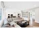 Open concept living room with sectional sofa and view into kitchen at 3828 Highland Park Dr, Greenwood, IN 46143