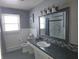 Updated bathroom, featuring a new vanity and bathtub at 515 Wedgewood Dr, Anderson, IN 46013
