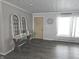 Entryway with gray walls, dark gray floors, and a console table at 515 Wedgewood Dr, Anderson, IN 46013