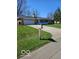 Single-story home features an attached garage and well-kept front yard at 515 Wedgewood Dr, Anderson, IN 46013