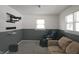 Gathering room with a comfortable couch and massage chair at 515 Wedgewood Dr, Anderson, IN 46013
