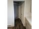 Hallway featuring modern hardwood floors and neutral paint colors at 515 Wedgewood Dr, Anderson, IN 46013