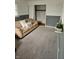 Living room featuring neutral walls and new carpet, offering a cozy atmosphere at 515 Wedgewood Dr, Anderson, IN 46013