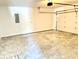 Attached garage with an automatic door opener at 521 N Swain St, Ingalls, IN 46048