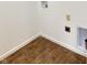 Laundry area with vinyl flooring and hookups at 521 N Swain St, Ingalls, IN 46048